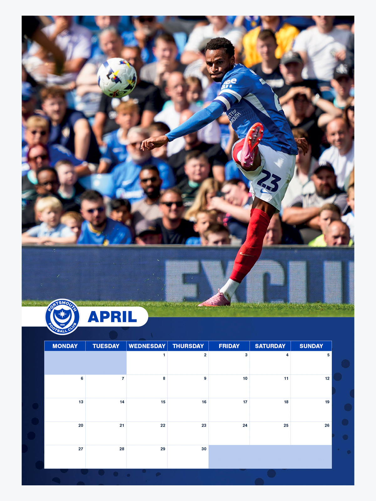 Inside spread of Portsmouth FC 2026 Calendar – large date panel and player action shot