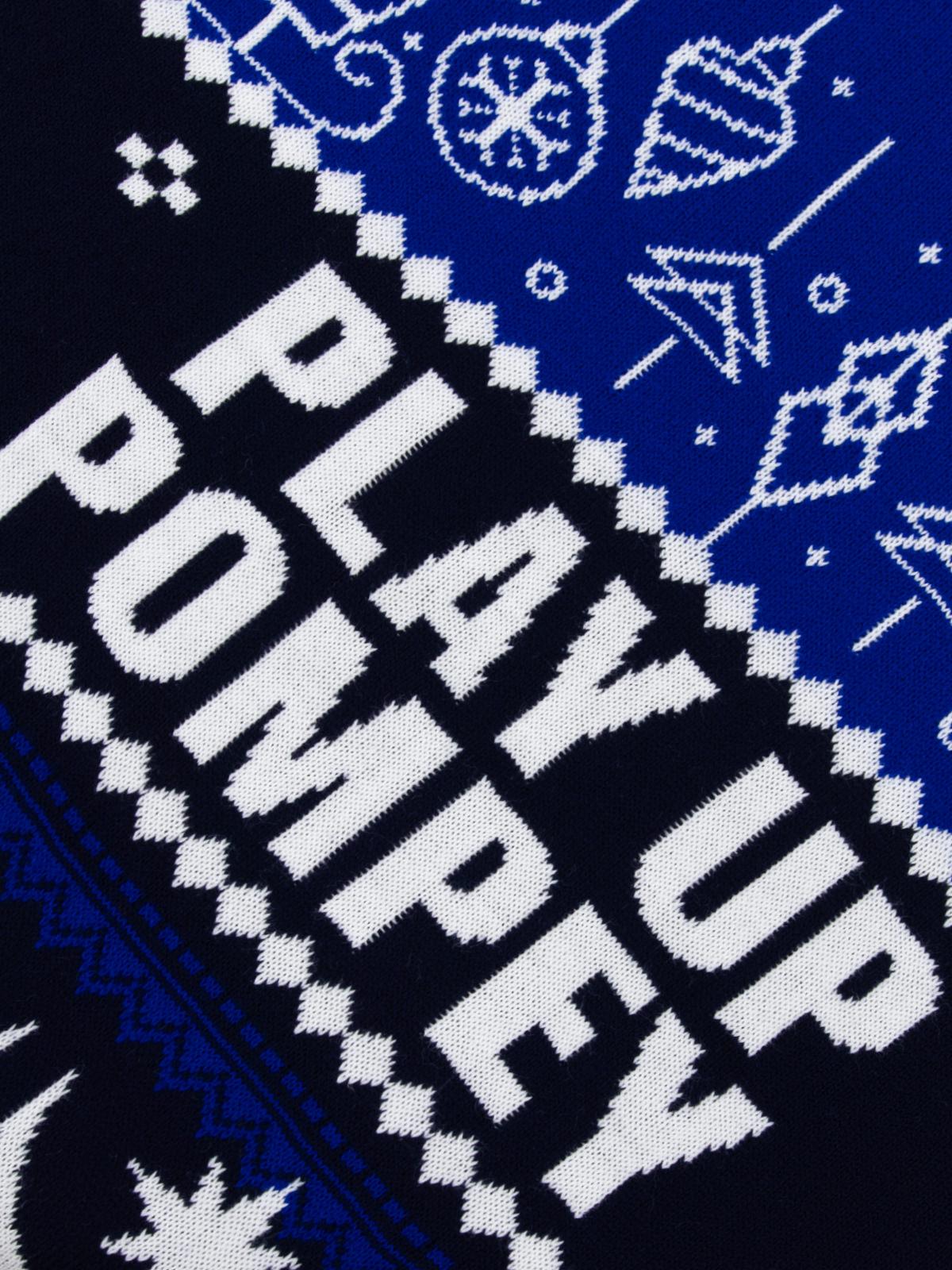Close-up of Portsmouth FC crest and snowflake design on 2025 Christmas Jumper. Features Play Up Pompey text.