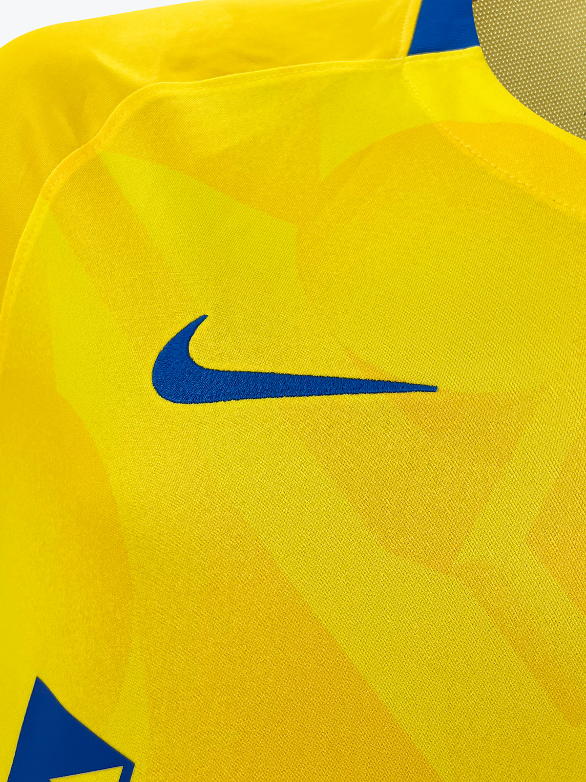 Close up of Nike Swoosh on the Portsmouth FC 26/27 Away Shirt