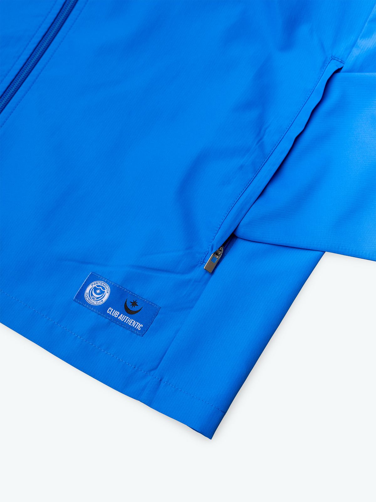 The side zip pocket of the Pompey Pro Shell Jacket